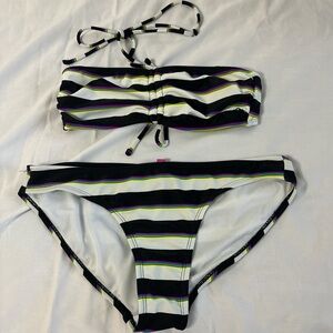 White, black, and neon stripped swimsuit.